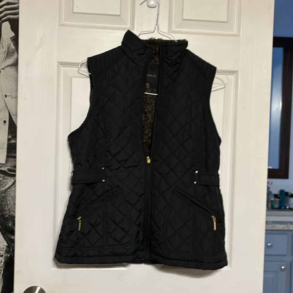 Like new women’s medium faux fur lined down vest.